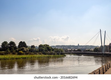 River Lune in Lancaster, UK with cable-stayed the Millennium Bridge in a background.