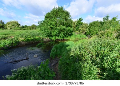 The River Mole In May In Horley In Surrey.