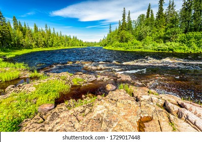 River Rapids Under Blue Sky