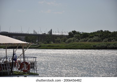 The River In The Rays Of The Sun. Noon Over The River, Bright Sun. Glitter Water.