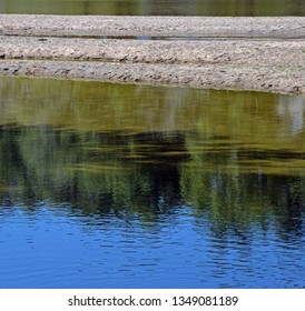 river reflections in summer