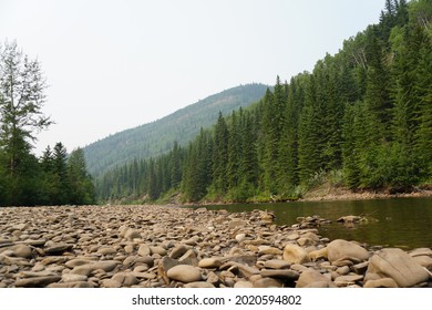 River Rock Shore Calm Flowing Water