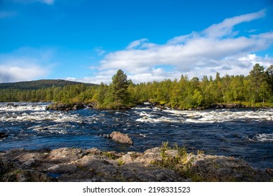 River Runs Trough National Parkland In Lapland Finland