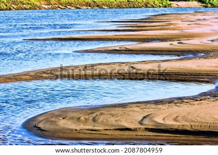 River sand bars (logjams, shallow spit), summer steady low water level (runoff low), river inversion, inland dunes and sandy beach