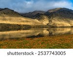 River shore scenery where the Clutha river flows through the  Cromwell Gorge