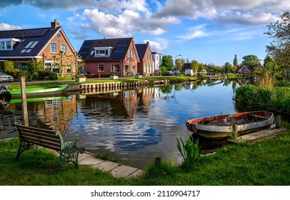 A river in a small town. Dutch culture - Shutterstock ID 2110904717