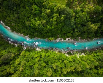 River Soca Cutting Trough Forest, Slovenia. Drone Photo.