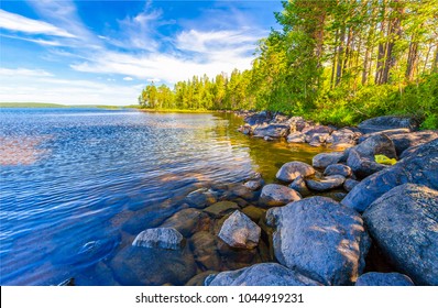 River stone in water, summer nature background - Shutterstock ID 1044919231
