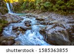 River stream waterfall in forest landscape