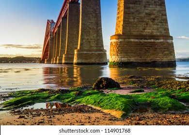 River And Sunset Over Forth Road Bridge In Scotland