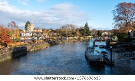 The River Thames between Twickenham and Richmond, west London UK. Photographed from the pedestrian bridge to Eel Pie Island on a clear winter's day in December. 