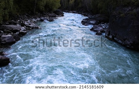 River threshold on the mountain river Chuya in the Republic of Altai near the mouth of the river Aigulak, Gorny Altai, Russia. Famous tourist destination
