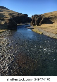 River Through a Canyon