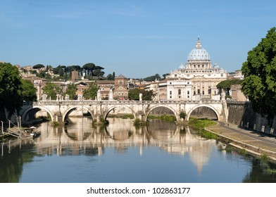 River Tiber in Rome - Italy. Including: Ponte Sant Angelo and St. Peter's Basilica in the background.