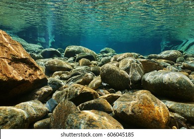 River Underwater Rocks On A Shallow Riverbed With Clear Water, Dumbea, Grande Terre Island, New Caledonia