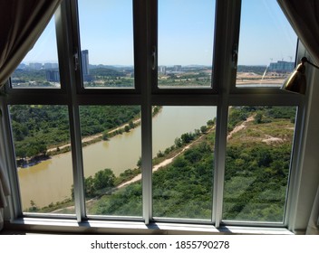 River view from behind the condominium window. - Shutterstock ID 1855790278