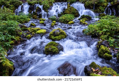 River waterfall on mossy stones. Mossy rocks in river waterfall. Waterfall cascade landscape. River waterfall view - Shutterstock ID 2172165691