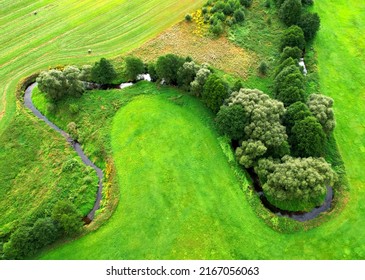 River In Wild, Aerial View. Zigzag River. Natural Resource And Ecosystem. Wildlife Refuge Wetland Restoration. European Green Nature Scenery. Greenhouse Gases, Ecology. Wetland, Marsh, Bog. Wildlife.