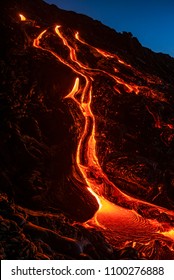 Rivers Of Lava Flowing Down A Hill