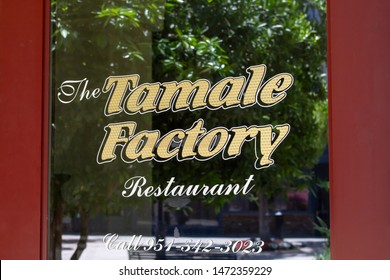 Riverside, California/United States - 07/06/19: A Door Decal Sign For The Mexican Restaurant Known As The Tamale Factory