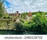 Riverside resident buildings along River Itchen in Winchester, UK