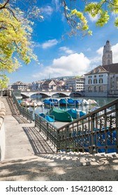 Riverside View Of Limmat River With Great Minster Church (Grossmünster), Wasserkirche And Münsterbrücke Of Zürich, Switzerland.