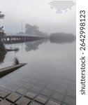 The Riverton Bridge and Canning River in Perth Western Australia on a very foggy morning.