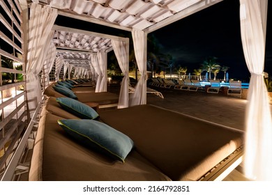                             Riviera Maya, Mexico - November 11, 2021: Cabana at Helios Infinity Pool, Grand Palladium White Sand Resort.   
