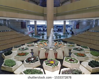 RIYADH, SAUDI ARABIA - APRIL 29, 2018: King Khalid International Airport Interior With Passengers And Flowers.