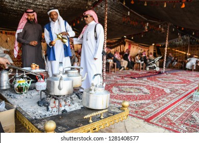 Riyadh, Saudi Arabia – December 29th 2018: Arabic Bedouin People In Traditional Clothes In Saudi Arabia Janadryah Festival.