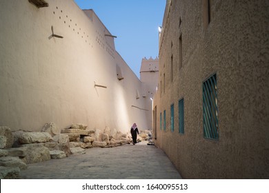 Riyadh / Saudi Arabia - January 8, 2020: Saudi People Entering A Mosque Next To Masmak Fortress