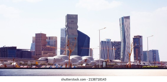 Riyadh, Saudi Arabia, KSA - August 25, 2021 new buildings in the King Abdullah Financial District with train metro bridge in Riyadh