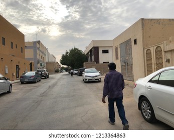 Riyadh, Saudi Arabia - October, 22 2018: A Man Is Walking Around In The Street Of The Capital City In Fall.