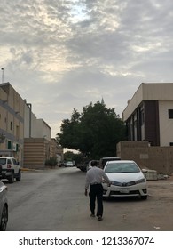 Riyadh, Saudi Arabia - October, 22 2018: A Man Is Walking Around In The Street Of The Capital City In Fall.