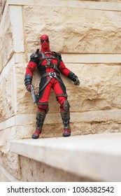 Riyadh, Saudi Arabia-February 26, 2018: Action figure of Deadpool or Wade Winston Wilson which is a fictional character from Xmen and Avengers published by Marvel comics 
