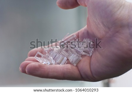RJ45 or 8P8C network cable plastic head hold by hand
