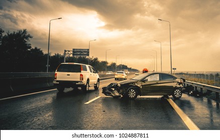 road accident in rainy highway - Shutterstock ID 1024887811