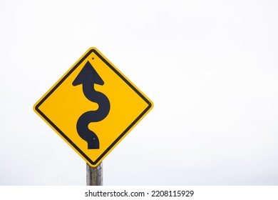 The Road Ahead Is A Winding Road. Warning Sign