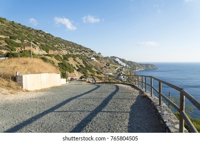 The road along the beautiful beaches on the coast of the island of Crete in a Sunny day.
