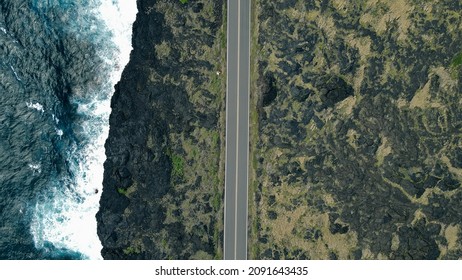 Road along the ocean. Aerial view from drone. Hawaii, USA - December 2021. High quality photo