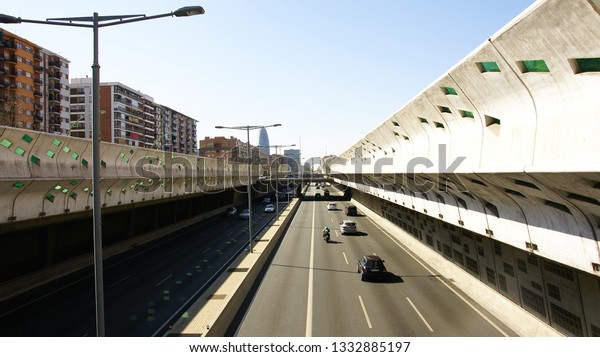 Road with anti noise screens in Barcelona,\
Catalunya, Spain