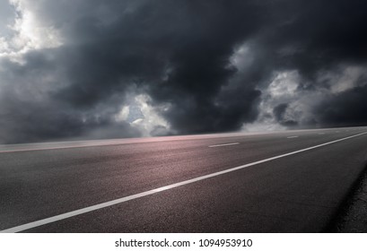 Road asphalt on cloud storm