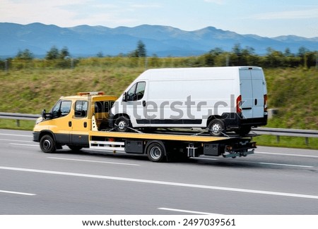 Road Assistance Tow-Truck With Out-Of-Order Commercial Cargo Bus