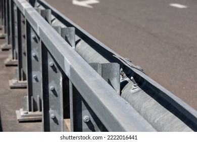 A Road Barrier On A Bridge Highway. Median Emergency Barriers To Protect Vehicles From Accidents.