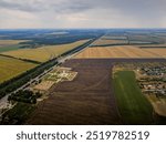The road between the agricultural land and farms at Kursk and Belgorod regions of Russia, close to the Ukrainian border and village Prokhorovka.
