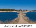 Road between lakes