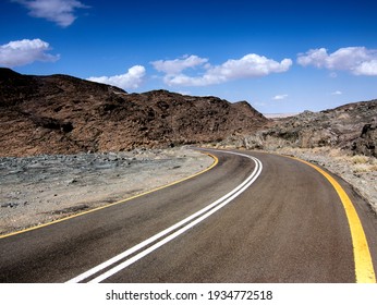 A road between the mountains in central Saudi Arabia