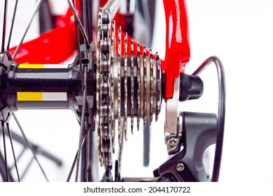 Road Bicycle Concept. Rear Cassette with New Chain. Focus on Cassette Cogs. Against White.Horizontal Image