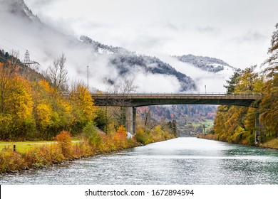 Road Bridge Across River To Thun Lake, Interlaken, Switzerland. Early Winter Of November 2019, Snow Start To Cover Mountain Area With Cold Temperature.