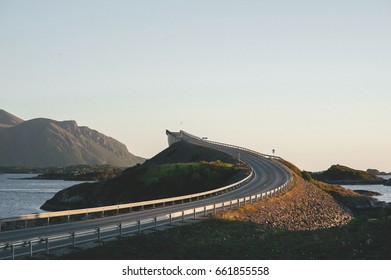 Road and bridge with field and mountain - Powered by Shutterstock